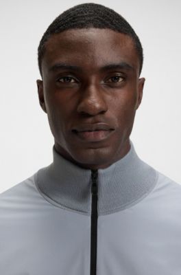 Thermoregulating hybrid jacket with zipped sleeve pocket, Grey