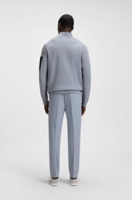 Thermoregulating hybrid jacket with zipped sleeve pocket, Grey