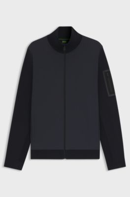 Thermoregulating hybrid jacket with zipped sleeve pocket, Dark Blue