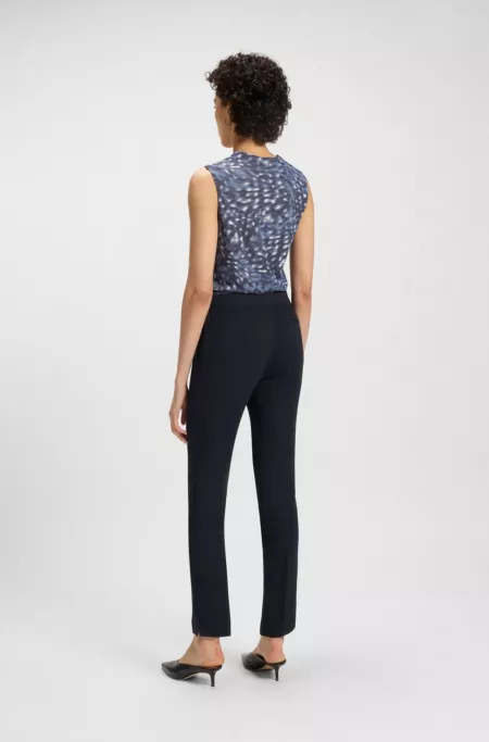 Slim-fit trousers with slit hems