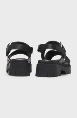 Leather sandals with buckled strap and chunky sole, Black