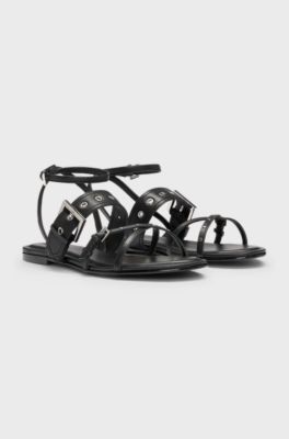 Leather sandals with metallic eyelets and studs, Black