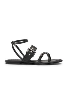 Leather sandals with metallic eyelets and studs, Black