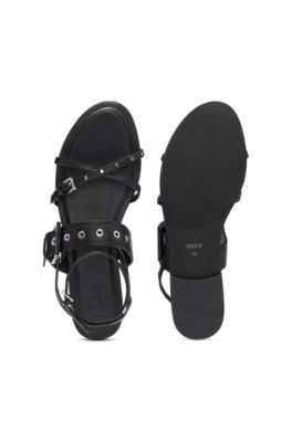 Leather sandals with metallic eyelets and studs, Black