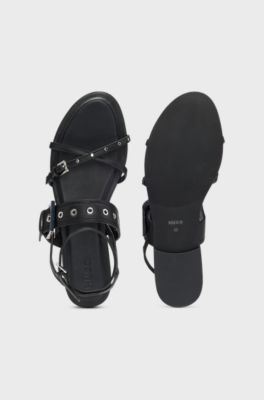 Leather sandals with metallic eyelets and studs, Black