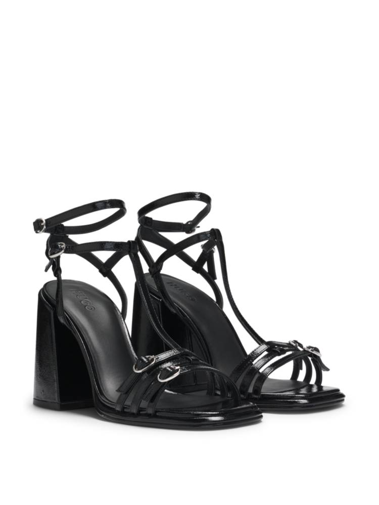Artikel klicken und genauer betrachten! - Mit den HUGO Sandalen mit 9,0 Zentimeter hohem Blockabsatz setzt du ein Statement. Die Riemchen sorgen für einen edgy Look.   Bei der Herstellung unserer Produkte sind wir immer auf der Suche nach nachhaltigeren Lösungen. Mindestens 60 % des Leders in diesem Produkt stammen aus zertifizierten Gerbereien.  | im Online Shop kaufen