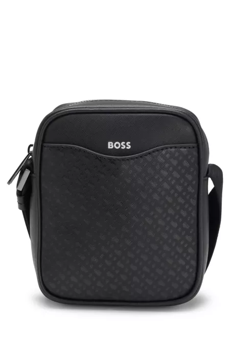 Reporter bag with monogram-patterned front pocket