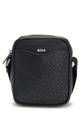 Reporter bag with monogram-patterned front pocket