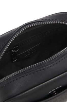 Reporter bag with monogram-patterned front pocket, Black