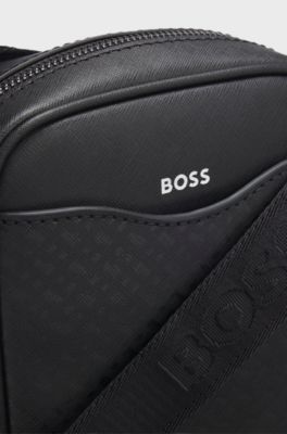 Reporter bag with monogram-patterned front pocket, Black