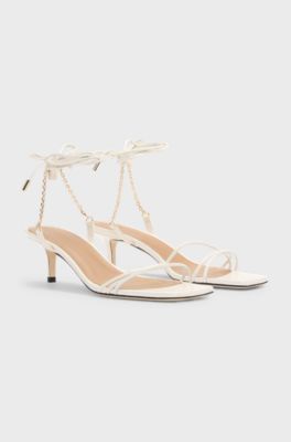 Leather sandals with gold-tone chain, White