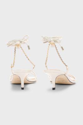Leather sandals with gold-tone chain, White