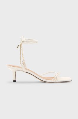 Leather sandals with gold-tone chain, White