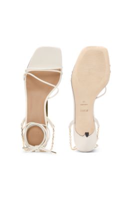 Leather sandals with gold-tone chain, White