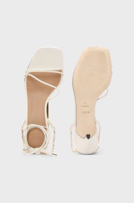 Leather sandals with gold-tone chain, White