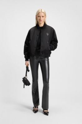 Faux-leather trousers with flared leg, Black