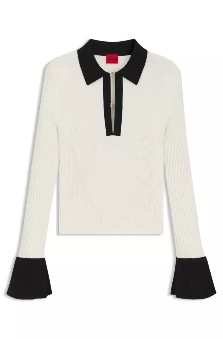 Knit polo with stacked-logo placket closures