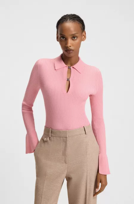 Knit polo with stacked-logo placket closures