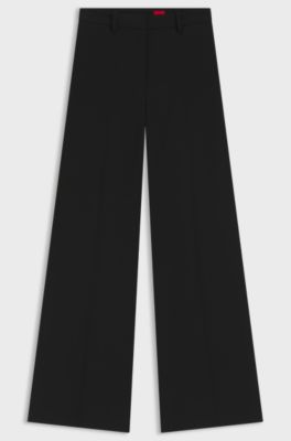 Pantaloni regular fit con gamba svasata in tessuto elasticizzato, Nero