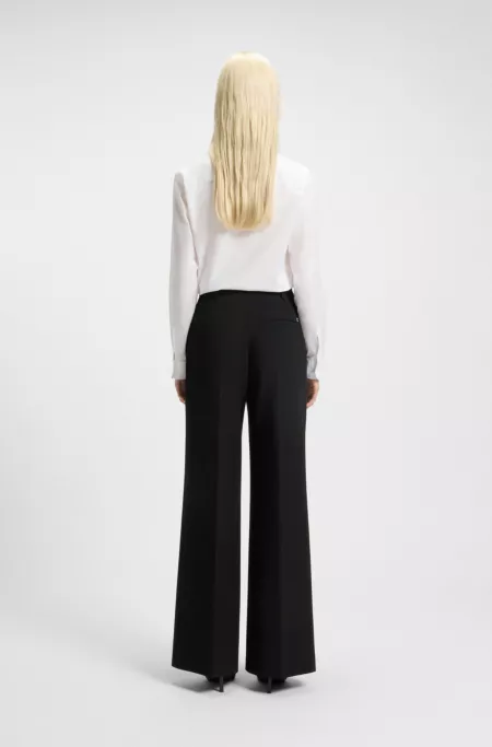Regular-fit flared-leg trousers in stretch fabric