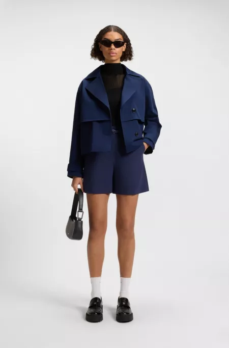 Pull à col montant avec finitions transparentes et unies