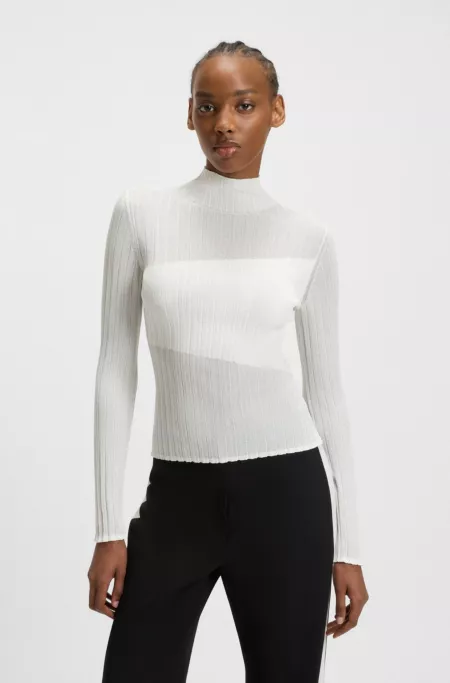 Mock-neck sweater with sheer and solid effects