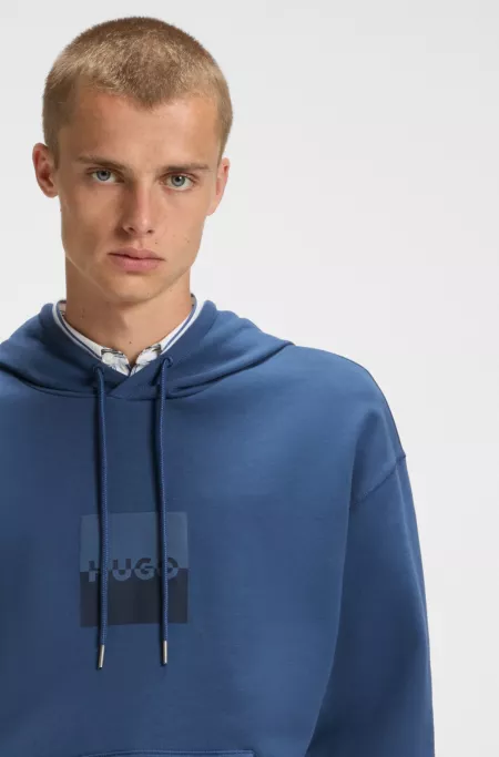Relaxed-fit hoodie in cotton terry with split logo
