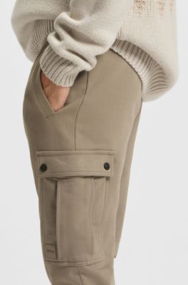 Relaxed-fit cotton-terry tracksuit bottoms with cargo pockets, Light Brown