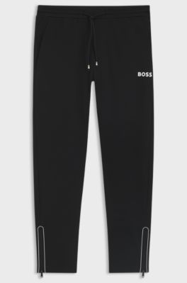 Active stretch-gabardine tracksuit bottoms with thermoregulating technology, Black