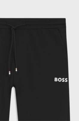 Active stretch-gabardine tracksuit bottoms with thermoregulating technology, Black