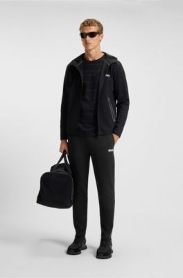Active stretch-gabardine tracksuit bottoms with thermoregulating technology, Black