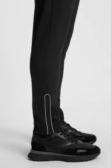 Active stretch-gabardine tracksuit bottoms with thermoregulating technology
