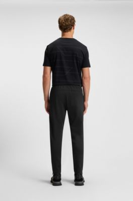 Active stretch-gabardine tracksuit bottoms with thermoregulating technology, Black