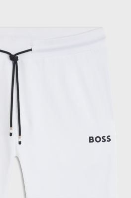 Active stretch-gabardine tracksuit bottoms with thermoregulating technology, White
