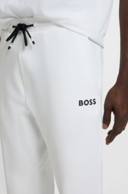 Active stretch-gabardine tracksuit bottoms with thermoregulating technology, White