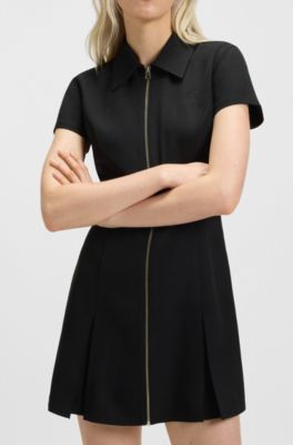 Robe pr&egrave;s du corps zipp&eacute;e sur le devant avec jupe pliss&eacute;e, Noir