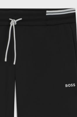 Cotton-blend tracksuit bottoms with striped trims, Black
