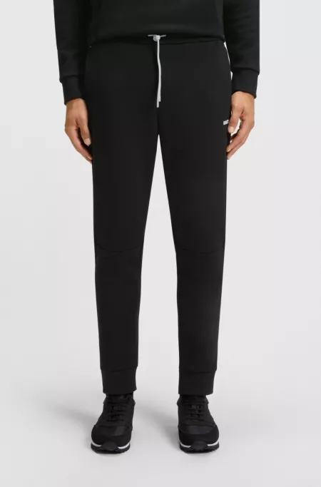 Cotton-blend tracksuit bottoms with striped trims