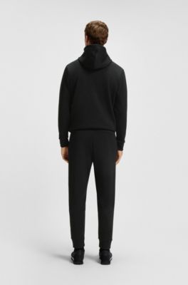 Cotton-blend tracksuit bottoms with striped trims, Black