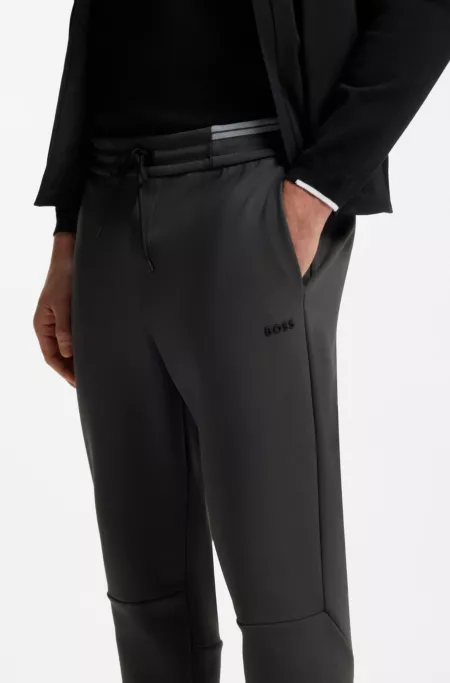 Cotton-blend tracksuit bottoms with striped trims