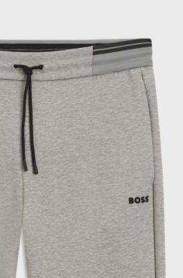 Cotton-blend tracksuit bottoms with striped trims, Grey