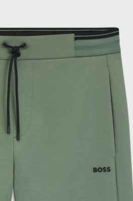 Cotton-blend tracksuit bottoms with striped trims, Green