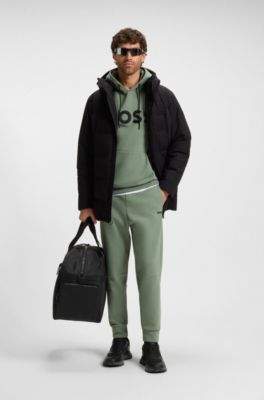 Cotton-blend tracksuit bottoms with striped trims, Green