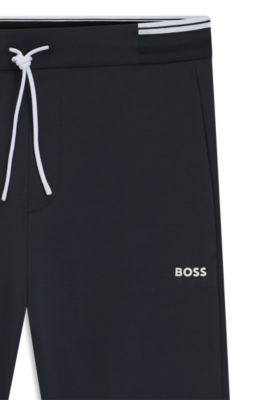 Tracksuit-byxor i bomullsblandning med randiga detaljer, M&ouml;rkbl&aring;