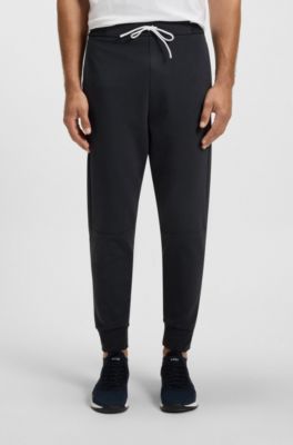 Pantalones de ch&aacute;ndal de algod&oacute;n con detalles de rayas, Azul oscuro