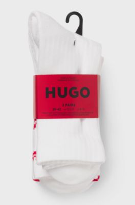 Pakke med tre par str&oslash;mper i kort l&aelig;ngde med opdelte logoer, Hvid