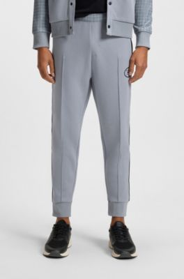 Check-print tracksuit bottoms in stretch piqu&eacute;, Grey