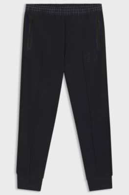 Check-print tracksuit bottoms in stretch piqu&eacute;, Dark Blue