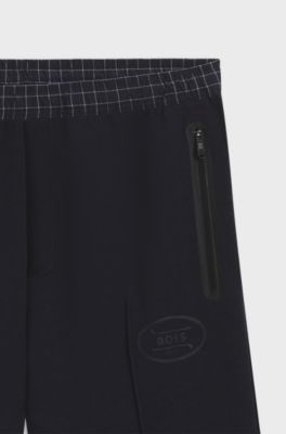 Check-print tracksuit bottoms in stretch piqu&eacute;, Dark Blue