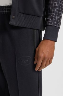 Check-print tracksuit bottoms in stretch piqu&eacute;, Dark Blue